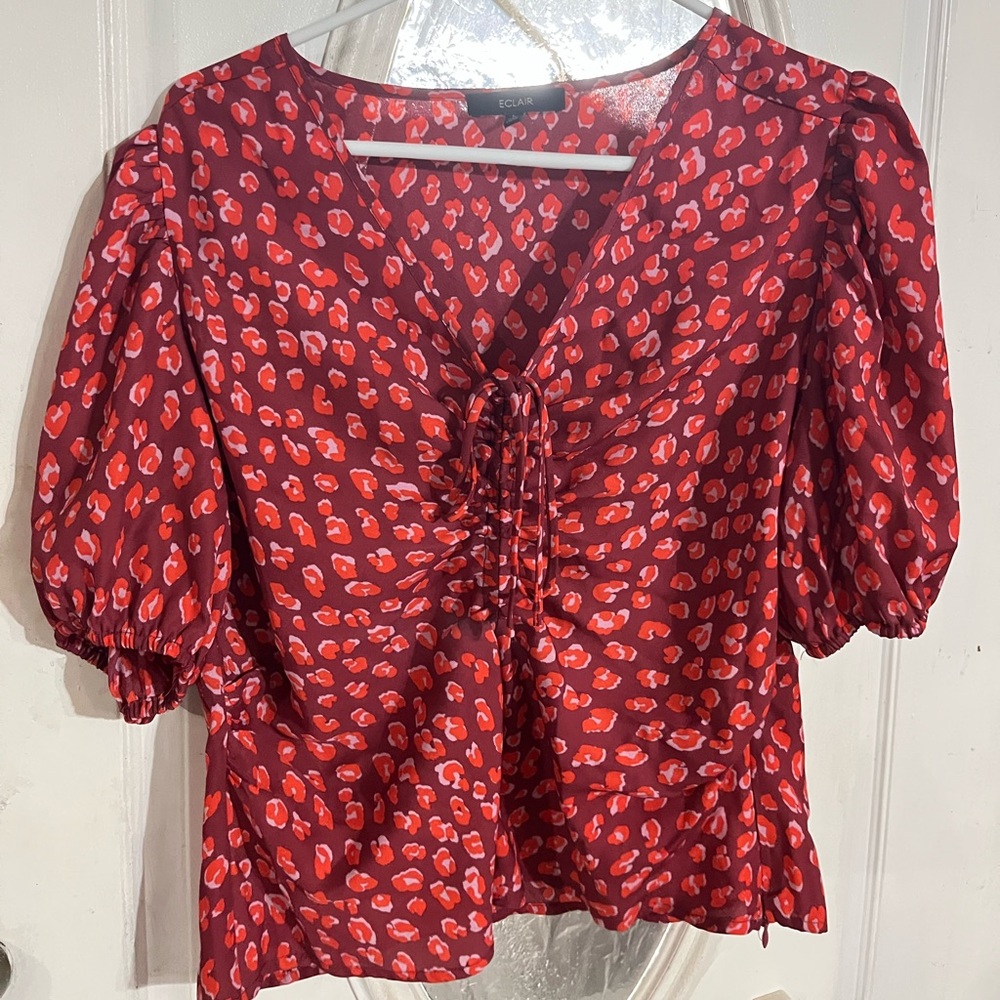Red blouse with side zipper